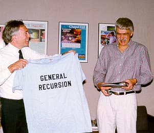 Steve Weiss presents gifts to Don Stanat (Photo by J. M. Walsh)