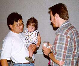 Terry Yoo (Ph.D. 1996), his son Duncan, and Bill Garrett (M.S. 1995) at SIGGRAPH Graphics Reunion (Photo 
by Jai Glasgow)