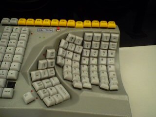 Some kind of crazy (supposedly ergonomic) one-handed keyboard Some kind of crazy (supposedly ergonomic) one-handed keyboard