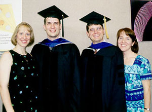 Ph.D. graduates and 
spouses (Photo by Claire Stone